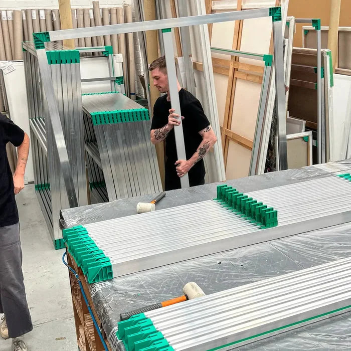 The Sydney Art Store team making aluminium artist stretcher frames